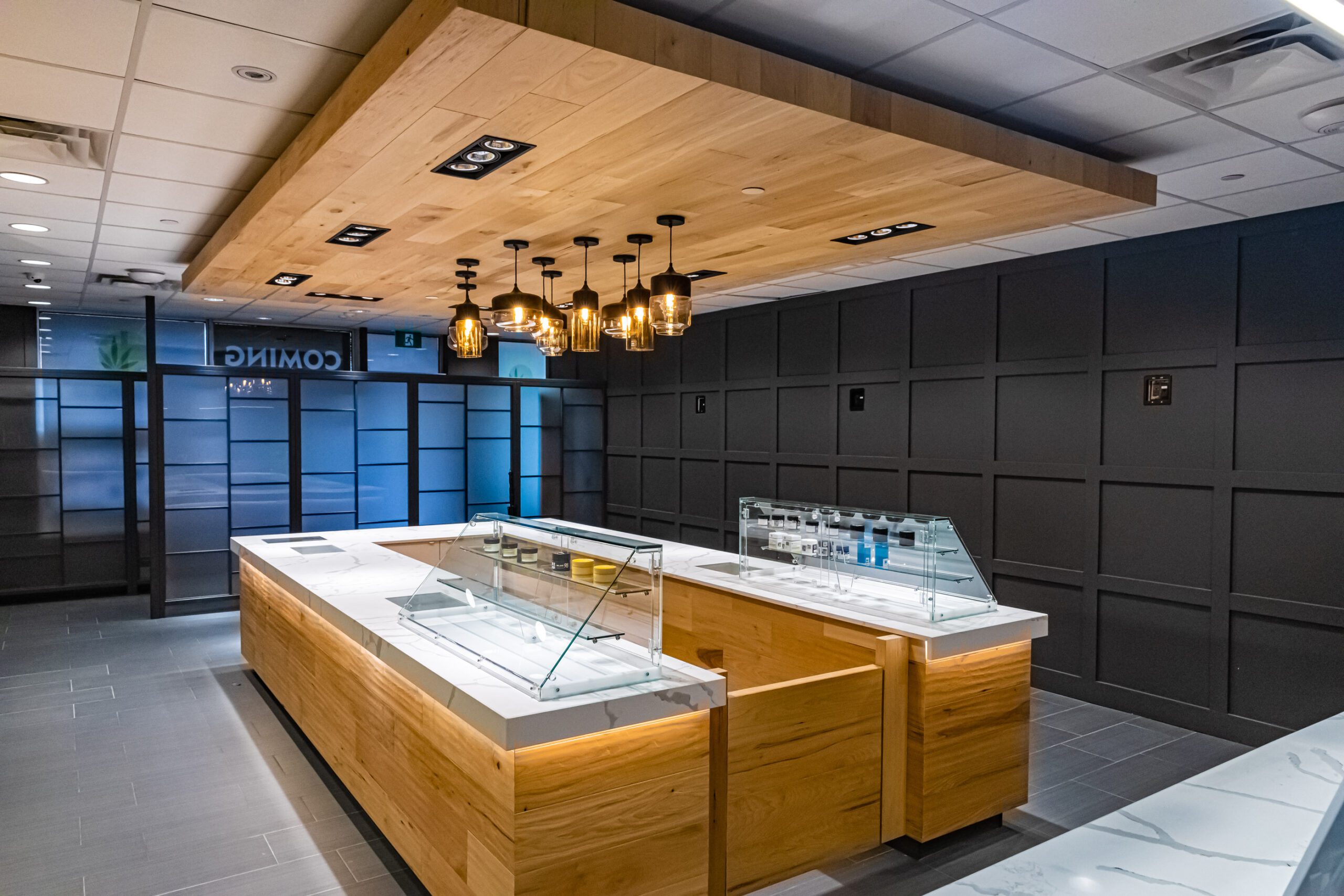 Detailed view of Chamba Co. Waterloo's cannabis product shelves and modern lighting.