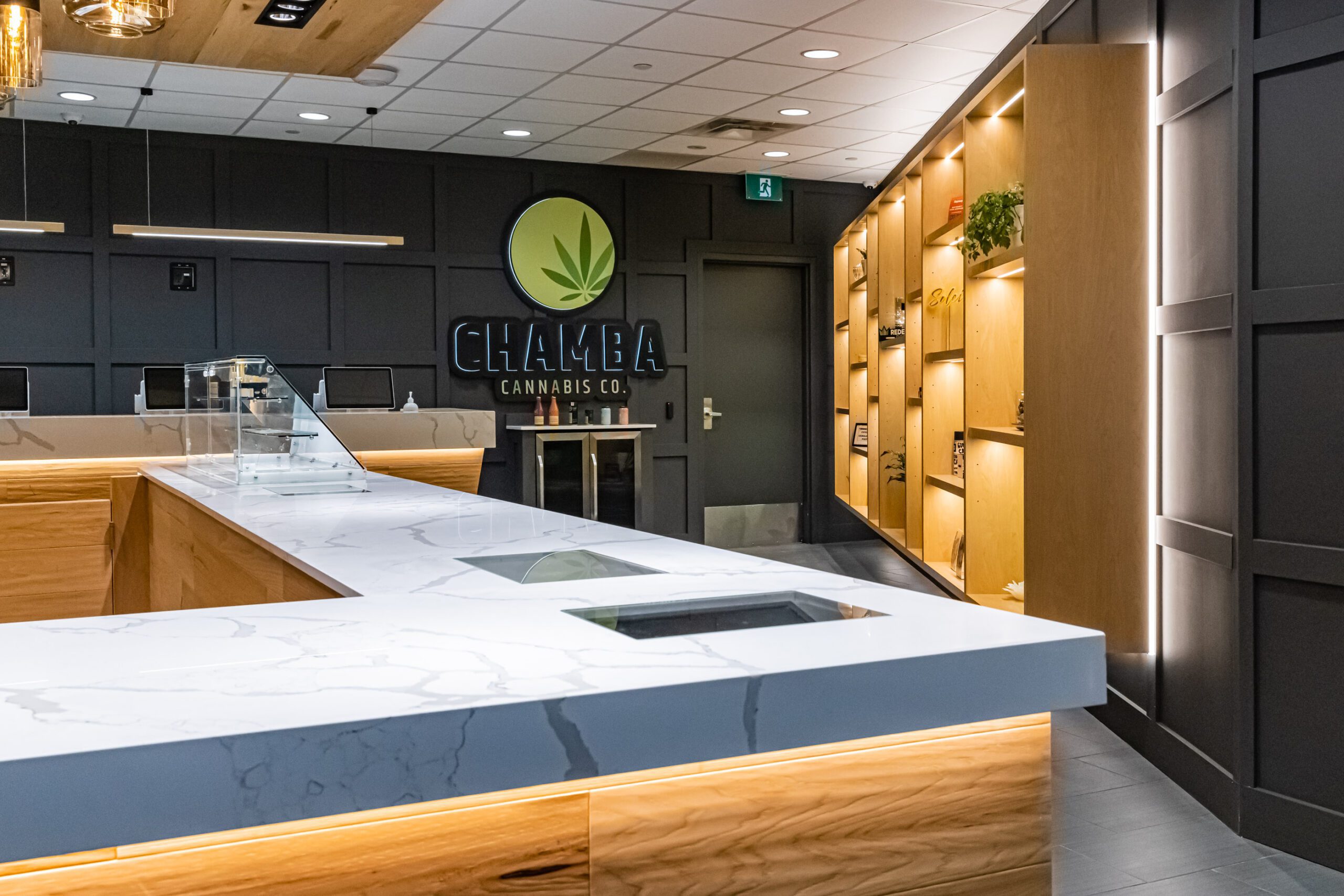 Counter display area at Chamba Cannabis Co. Waterloo store with modern design and lighting.
